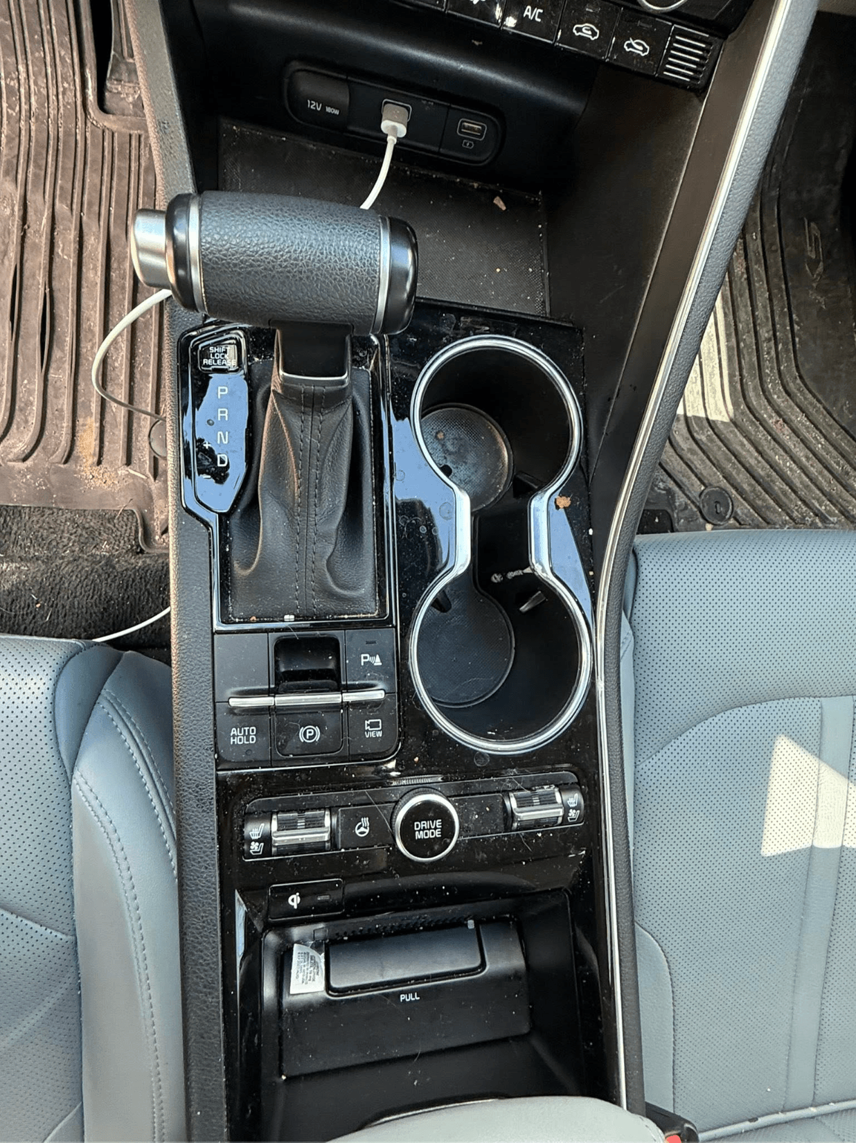 Center console, shifter, and cupholders deep-cleaned